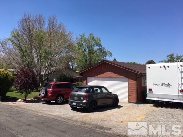 14060 Perlite Drive Reno, NV 89521 - Photo 2 of 15 a view of a car parked in front of a house