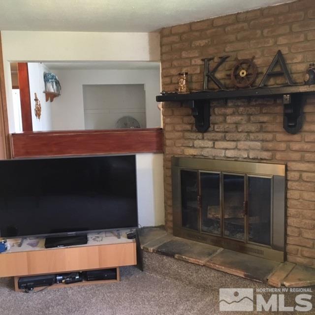 14060 Perlite Drive Reno, NV 89521 - Photo 5 of 15 a living room with fireplace