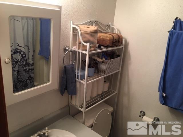 14060 Perlite Drive Reno, NV 89521 - Photo 7 of 15 a utility room with dryer and washer