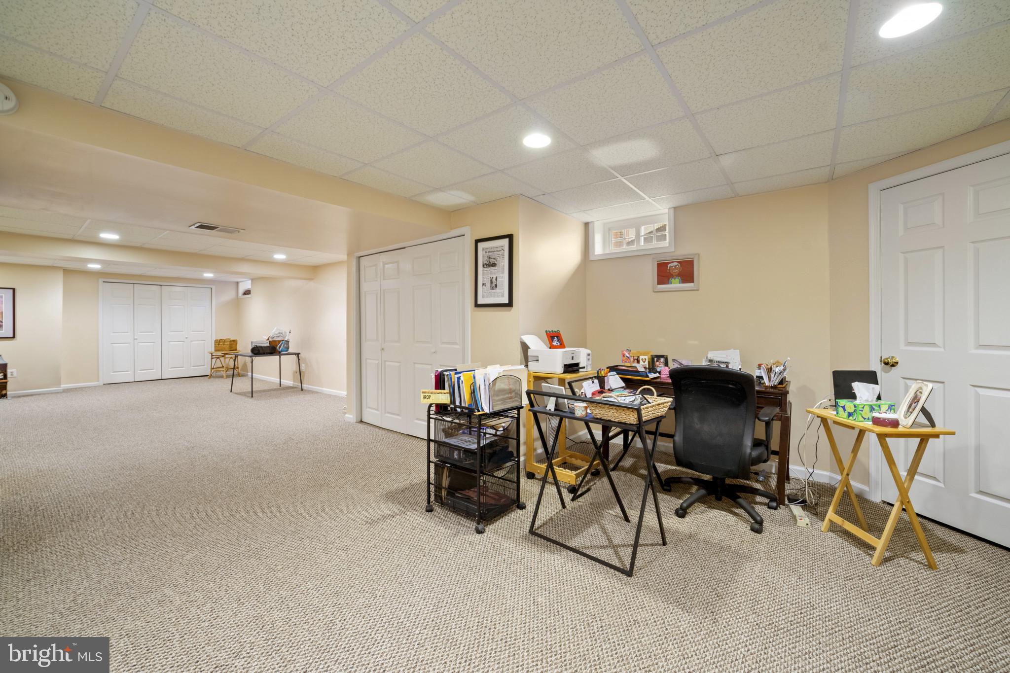 211 South Norwinden Drive Springfield, PA 19064 - Photo 22 of 38 a view of a workspace with furniture and a window