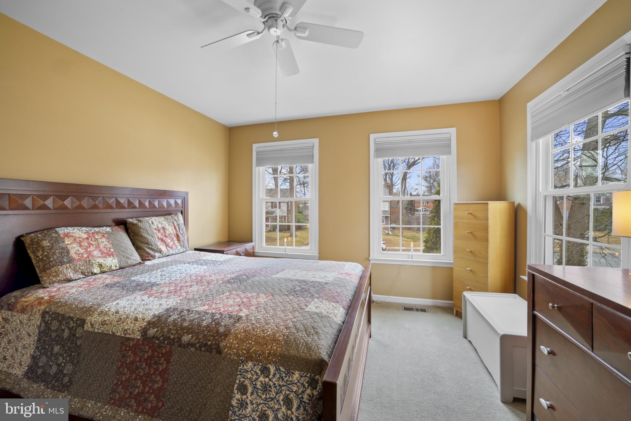 211 South Norwinden Drive Springfield, PA 19064 - Photo 23 of 38 a spacious bedroom with a bed and wooden floor