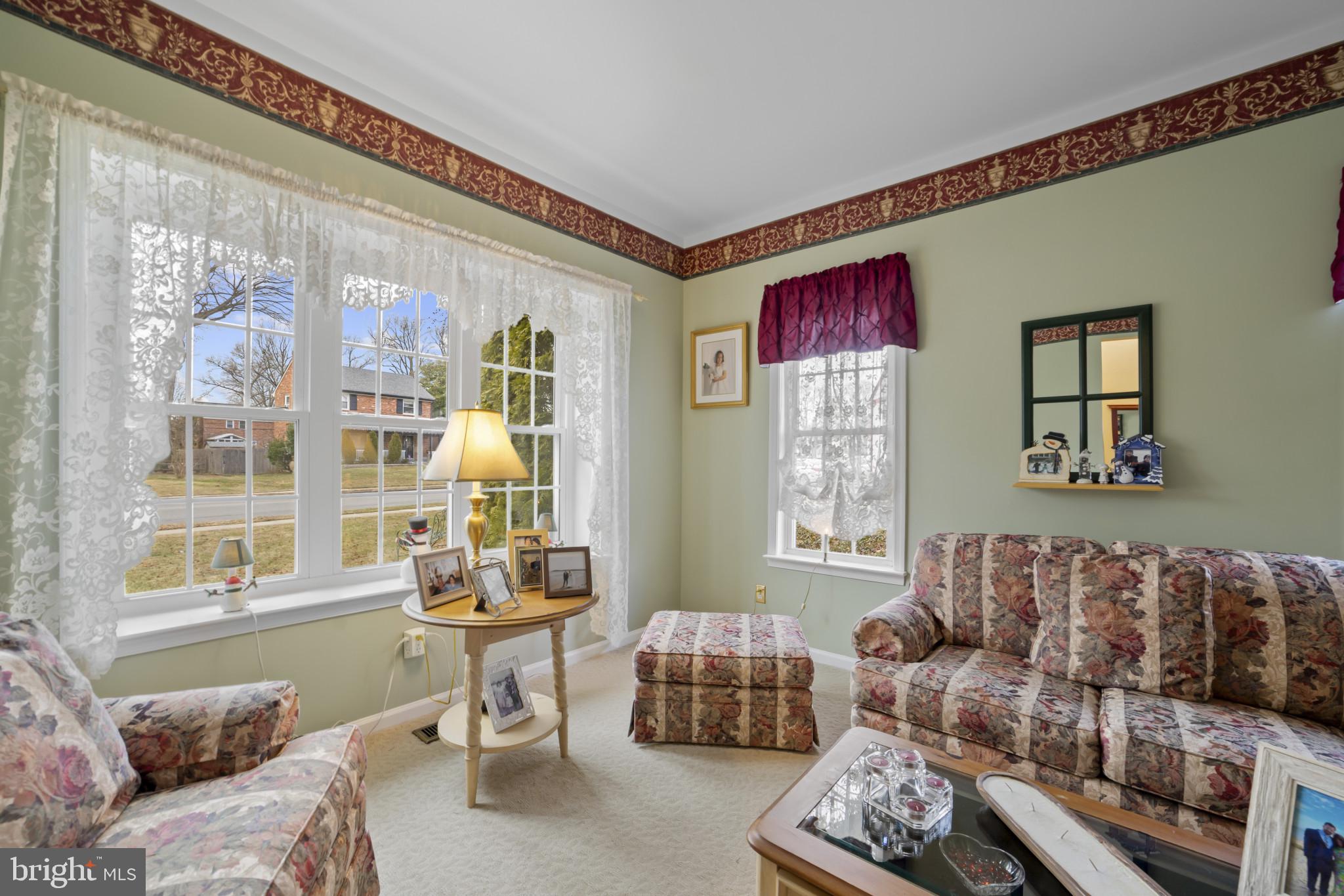 211 South Norwinden Drive Springfield, PA 19064 - Photo 7 of 38 a living room with furniture and a window