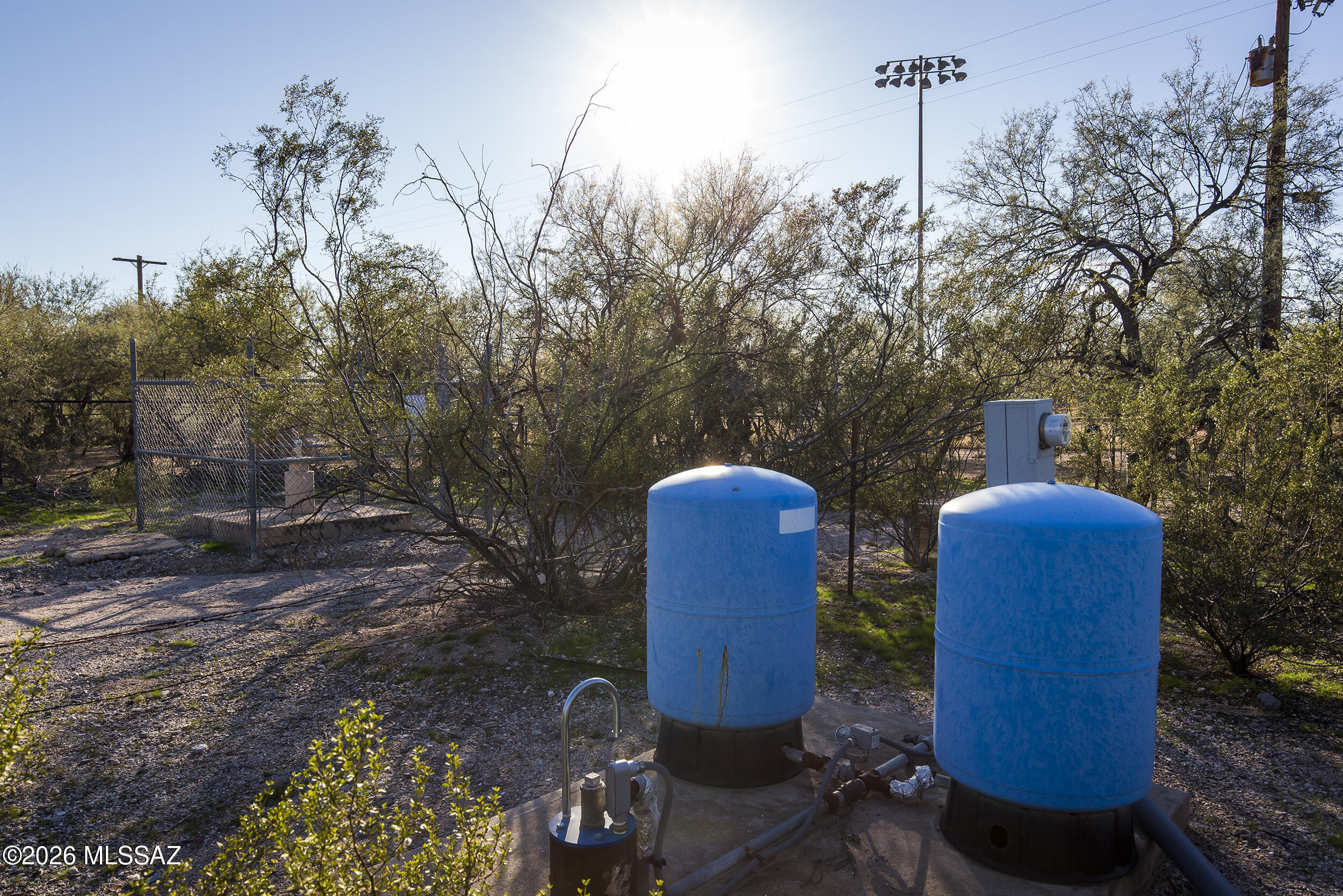 4130 East River Road Tucson, AZ 85718 - Photo 42 of 46 a backyard of a house with table and chairs