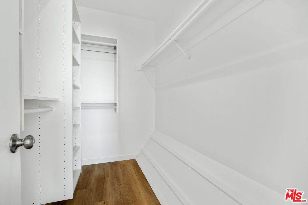 31246 Bailard Road Malibu, CA 90265 - Photo 20 of 31 a view of a room with wooden floor and a bathroom