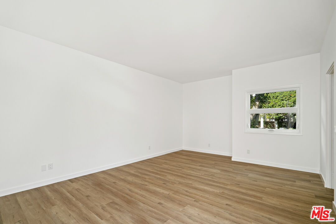 31246 Bailard Road Malibu, CA 90265 - Photo 27 of 31 a view of empty room with wooden floor