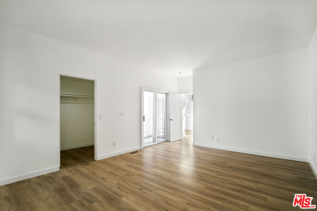 31246 Bailard Road Malibu, CA 90265 - Photo 28 of 31 a view of an empty room with wooden floor