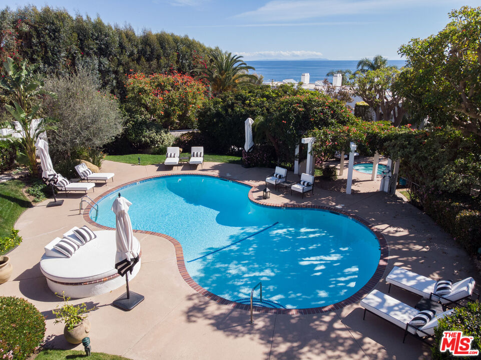 31246 Bailard Road Malibu, CA 90265 - Photo 29 of 31 a view of a swimming pool with sitting area