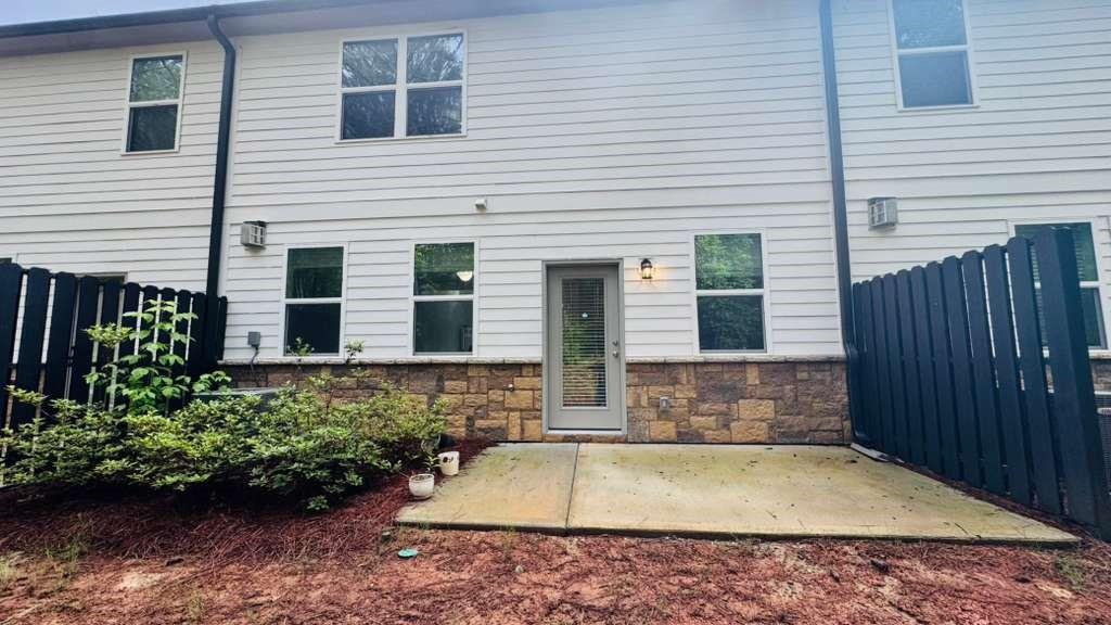 4078 Haleston Road Duluth, GA 30097 - Photo 17 of 25 a view of a house with a yard