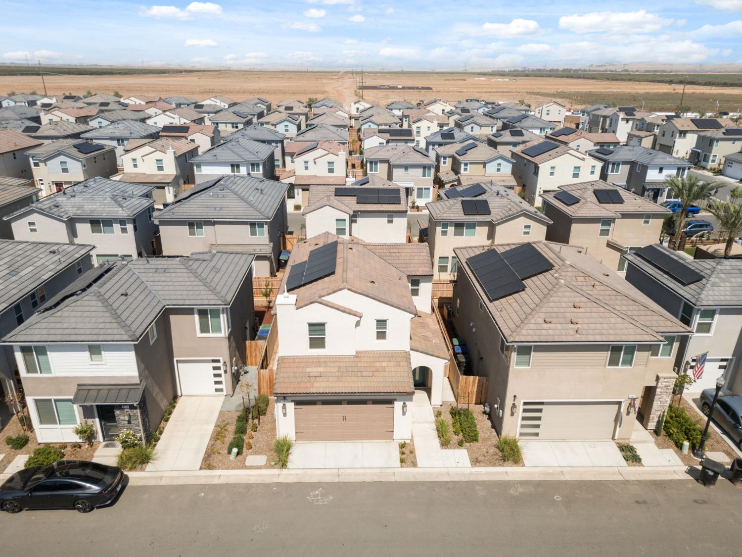 1109 Royalty Way West Madera, CA 93636 - Photo 42 of 47 an aerial view of residential houses with outdoor space