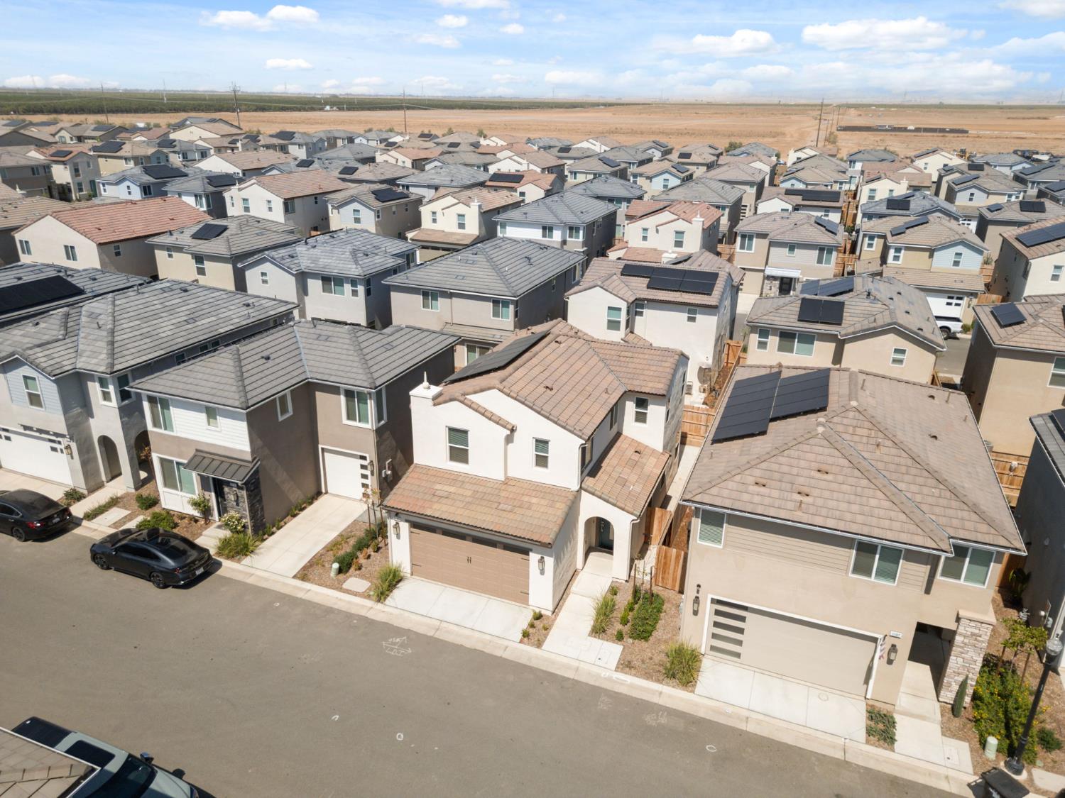 1109 Royalty Way West Madera, CA 93636 - Photo 43 of 47 an aerial view of residential houses with outdoor space