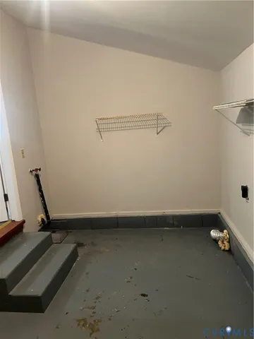 a view of a room with rack on the wall