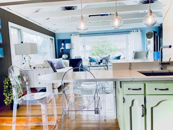 a kitchen with cabinets and window