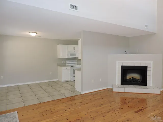 a view of a livingroom with a fireplace