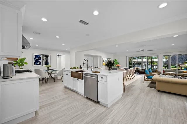 a view of a patio with a table and chairs