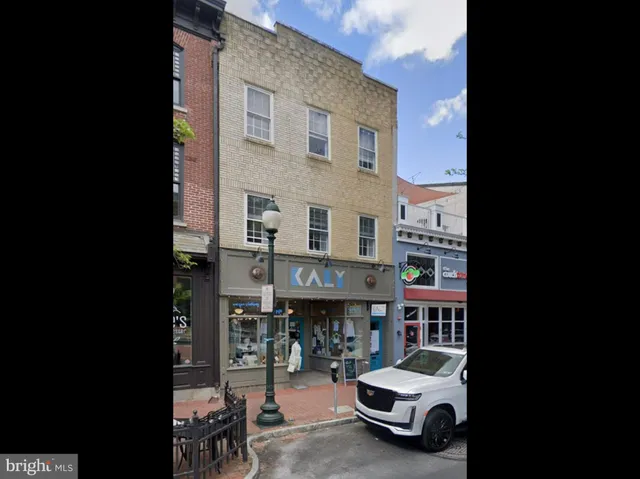 a car parked in front of a building