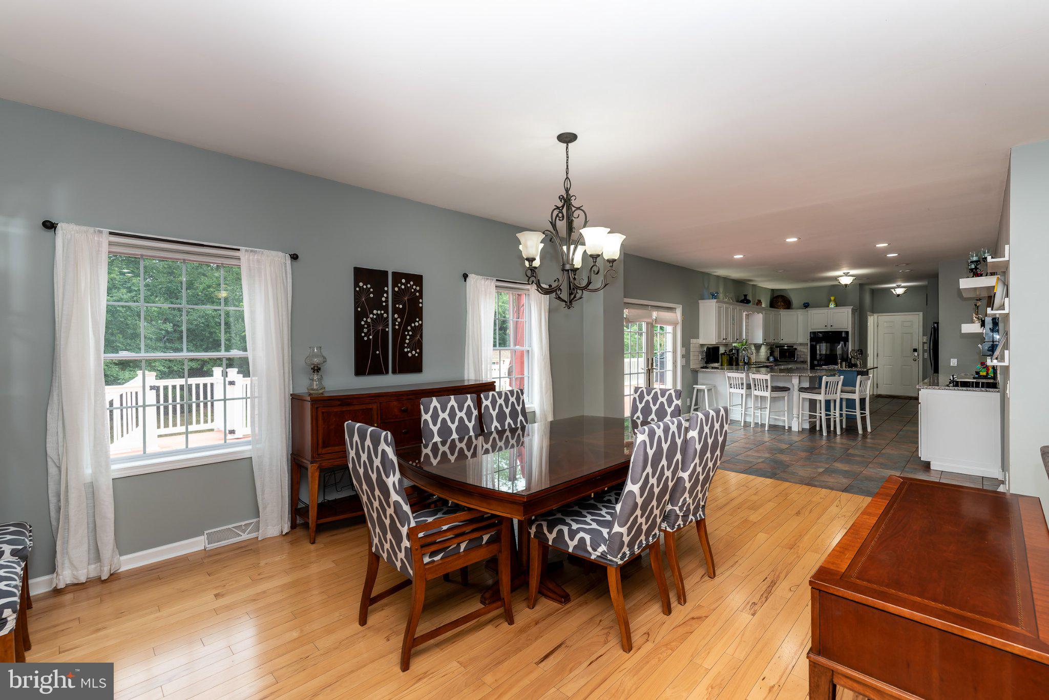 309 East Weymouth Road Newfield, NJ 08344 - Photo 3 of 10 Inviting dining space with natural light.