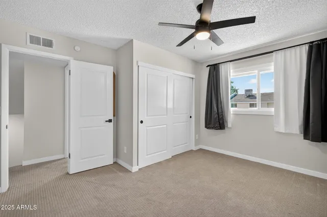 a room with a mirror and a sink