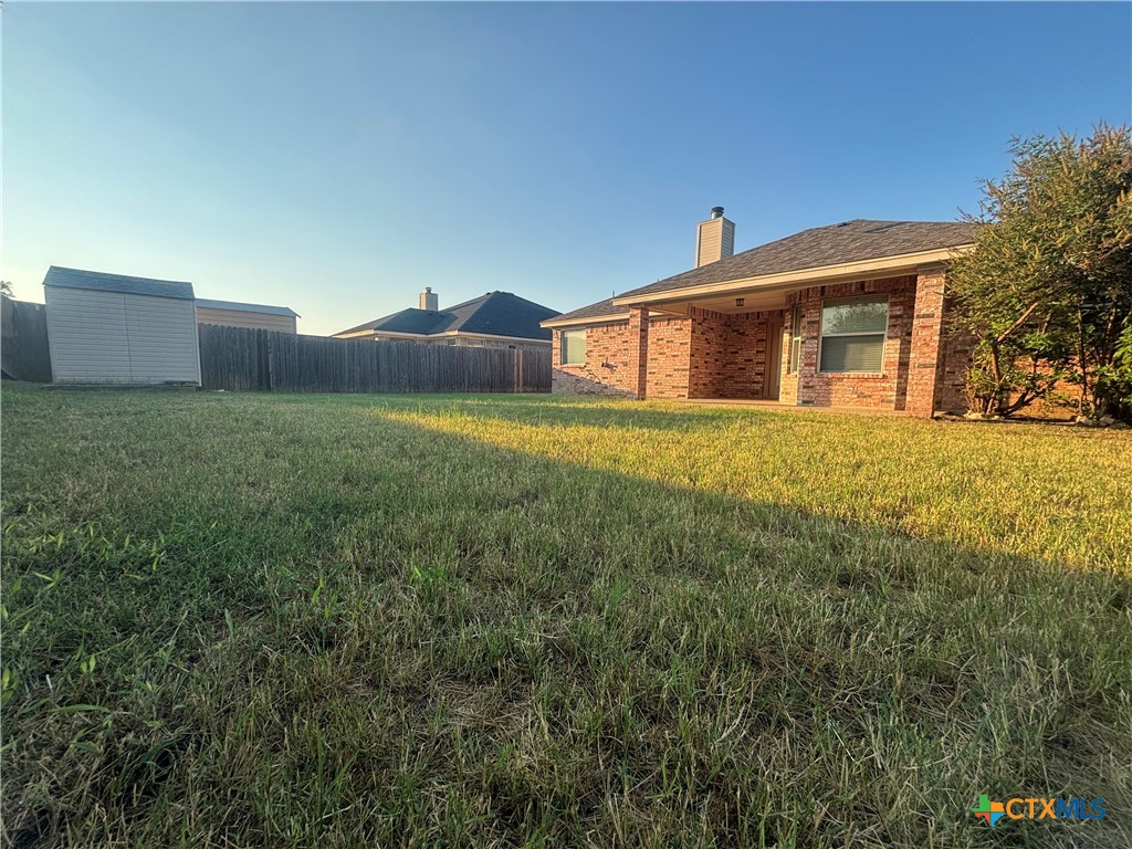 3610 Armstrong County Court Killeen, TX 76549 - Photo 24 of 29 a front view of house with yard and trees around