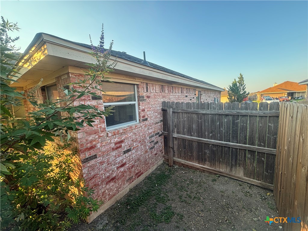 3610 Armstrong County Court Killeen, TX 76549 - Photo 27 of 29 a view of a house with a wooden deck