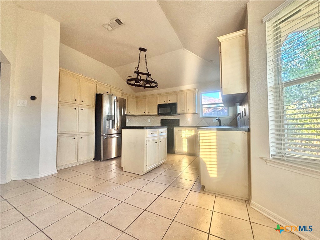 3610 Armstrong County Court Killeen, TX 76549 - Photo 8 of 29 a view of a kitchen with furniture and windows