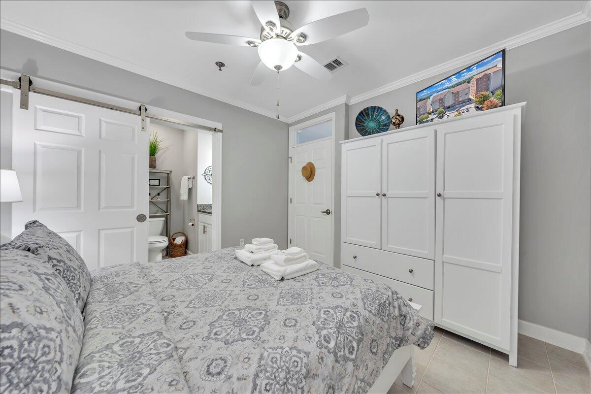 1245 Graves Harbor Trail, Unit 217 Huddleston, VA 24104 - Photo 17 of 39 a bedroom with a bed and a window