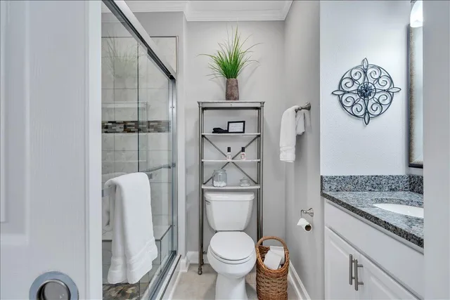 a large kitchen with stainless steel appliances kitchen island granite countertop lots of counter top space