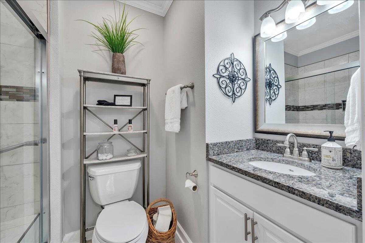 1245 Graves Harbor Trail, Unit 217 Huddleston, VA 24104 - Photo 19 of 39 a bathroom with a toilet sink and mirror