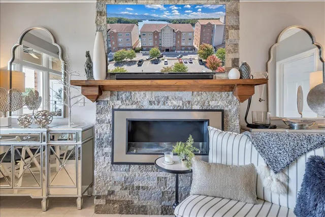 a kitchen with granite countertop a sink stove and cabinets