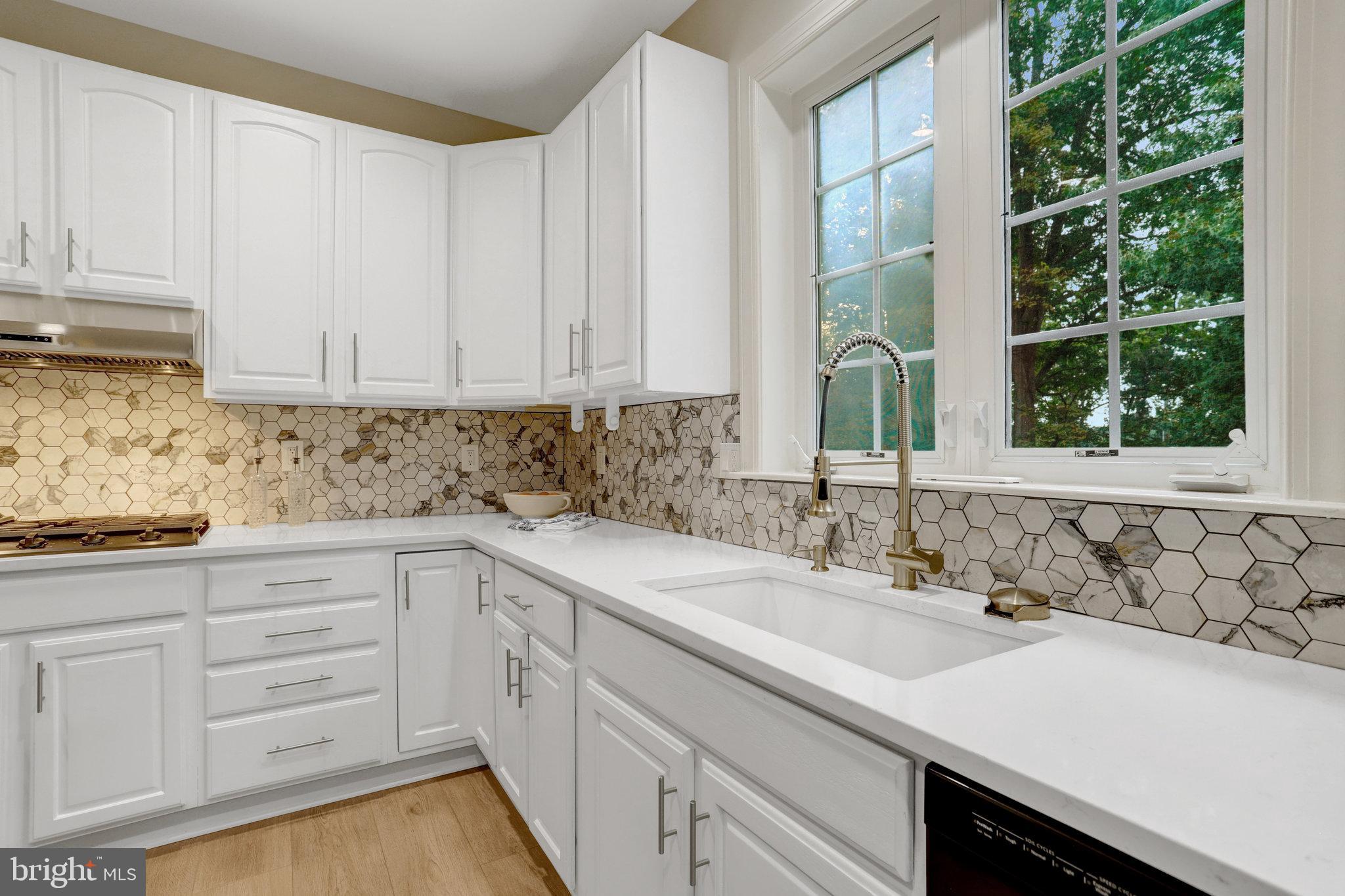 3905 Cook Street Alexandria, VA 22311 - Photo 13 of 39 a kitchen with a sink and cabinets
