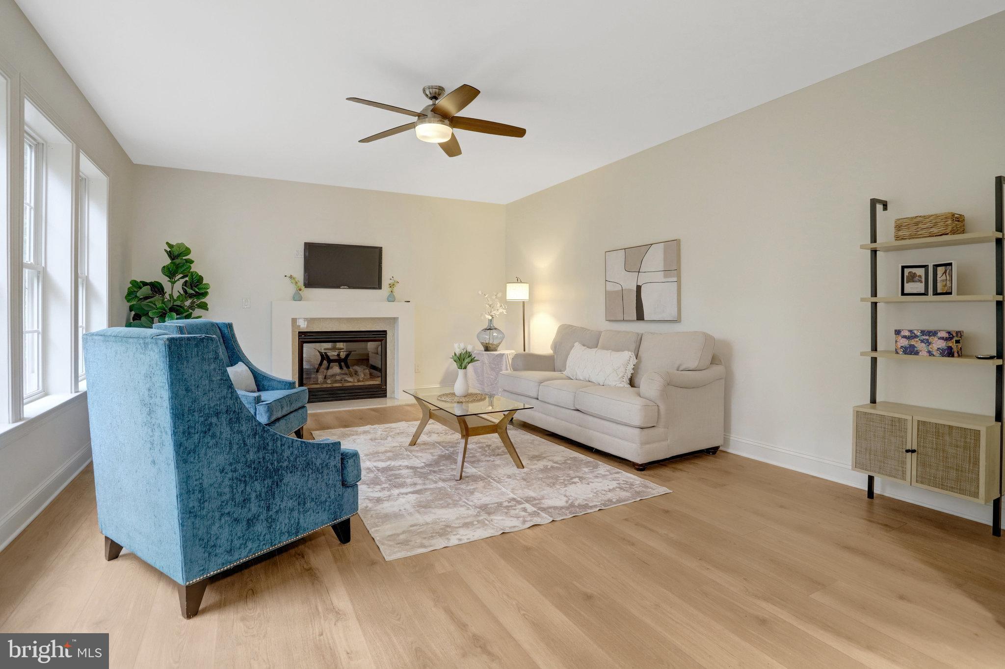 3905 Cook Street Alexandria, VA 22311 - Photo 15 of 39 a living room with furniture and a fireplace
