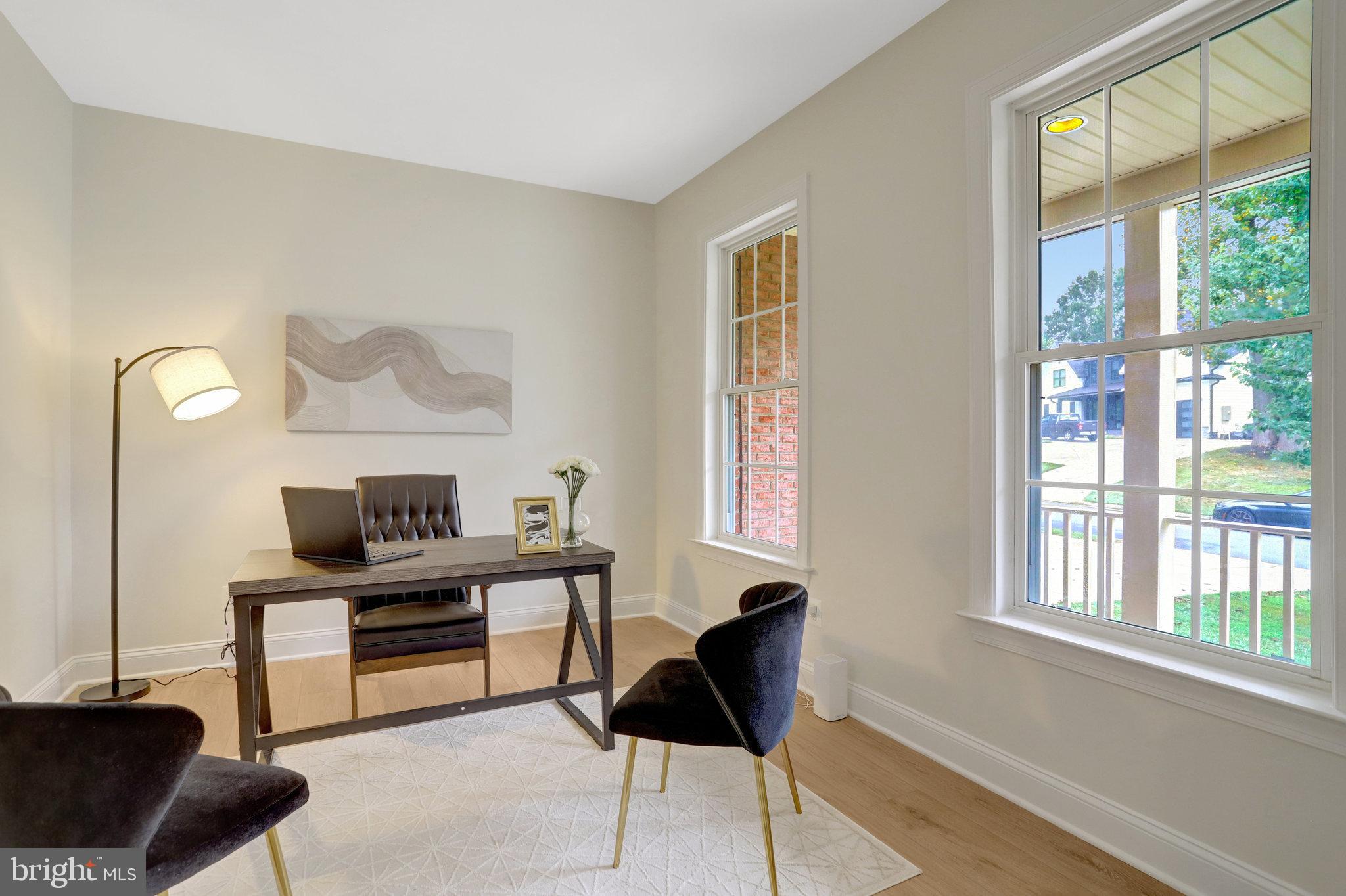 3905 Cook Street Alexandria, VA 22311 - Photo 17 of 39 a view of a workspace with furniture and a window