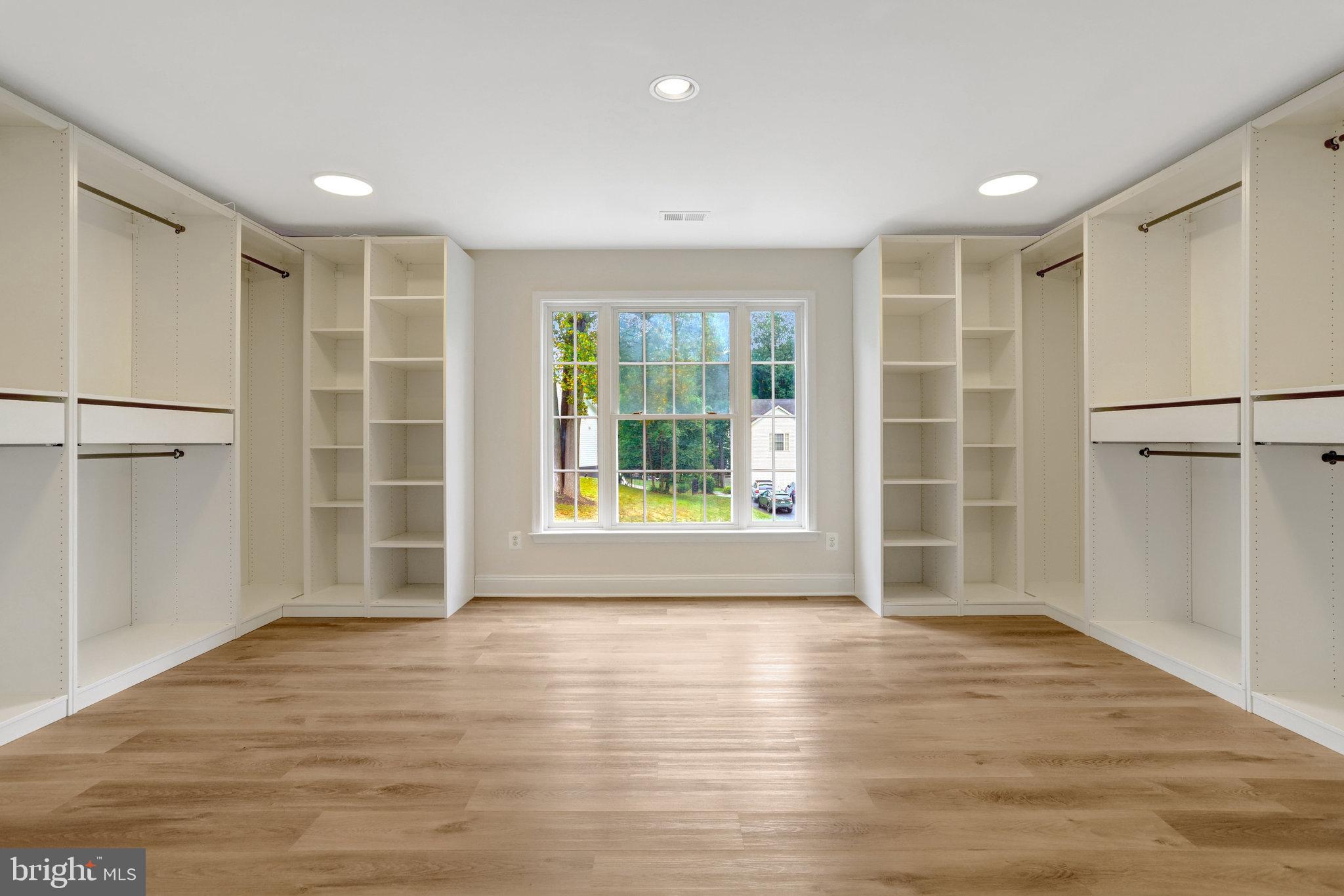 3905 Cook Street Alexandria, VA 22311 - Photo 27 of 39 a view of an empty room with a window and wooden floor