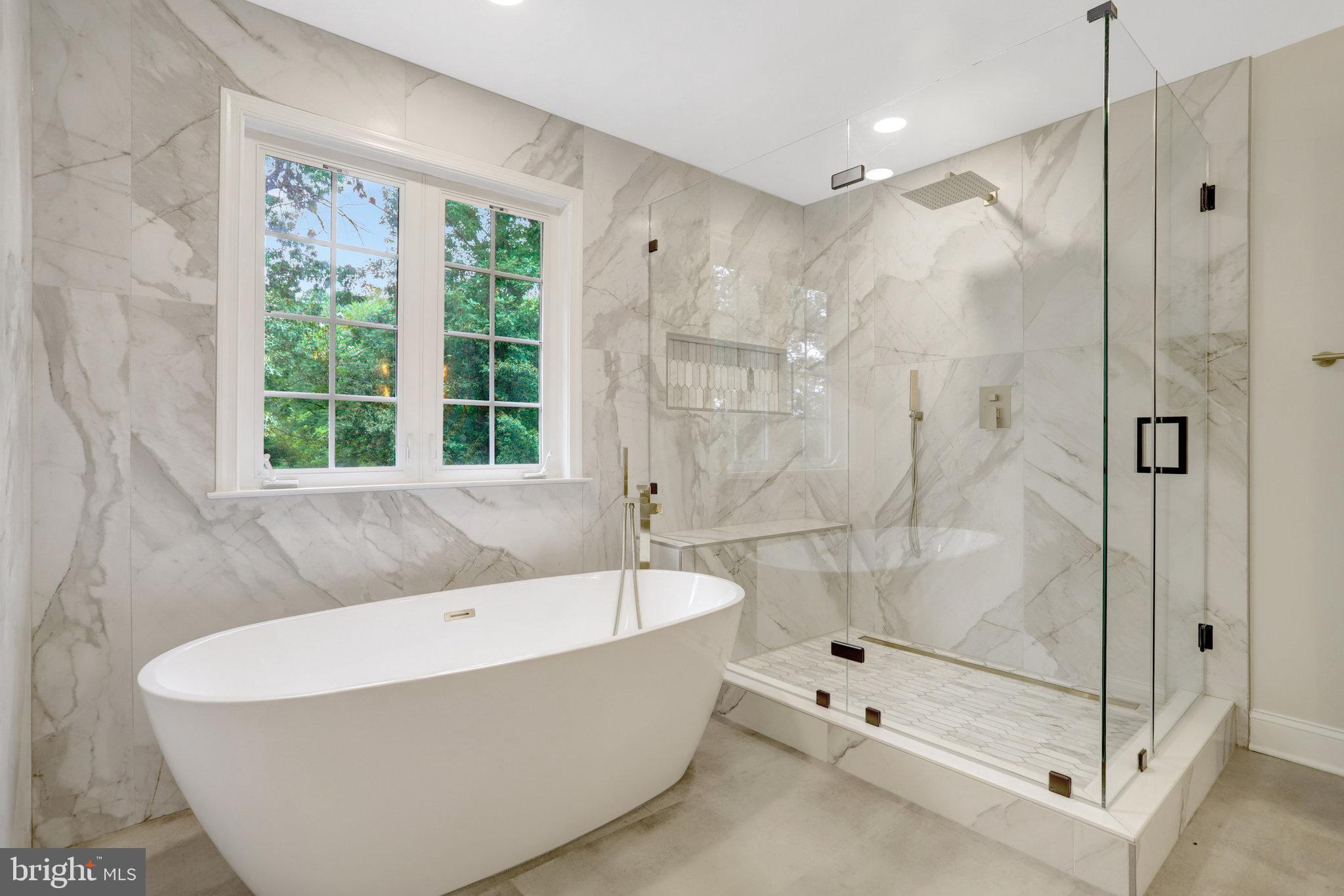 3905 Cook Street Alexandria, VA 22311 - Photo 29 of 39 a bathroom with a bathtub and a shower