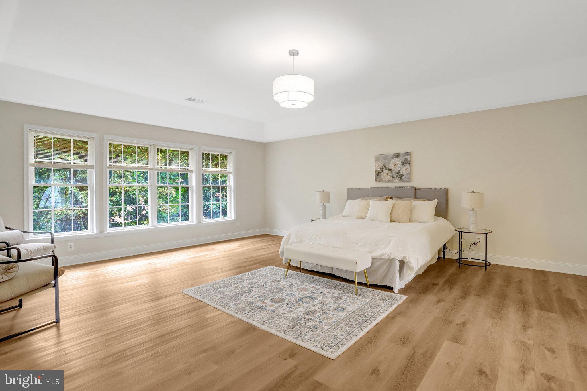 3905 Cook Street Alexandria, VA 22311 - Photo 5 of 39 a spacious bedroom with a large bed and a large window