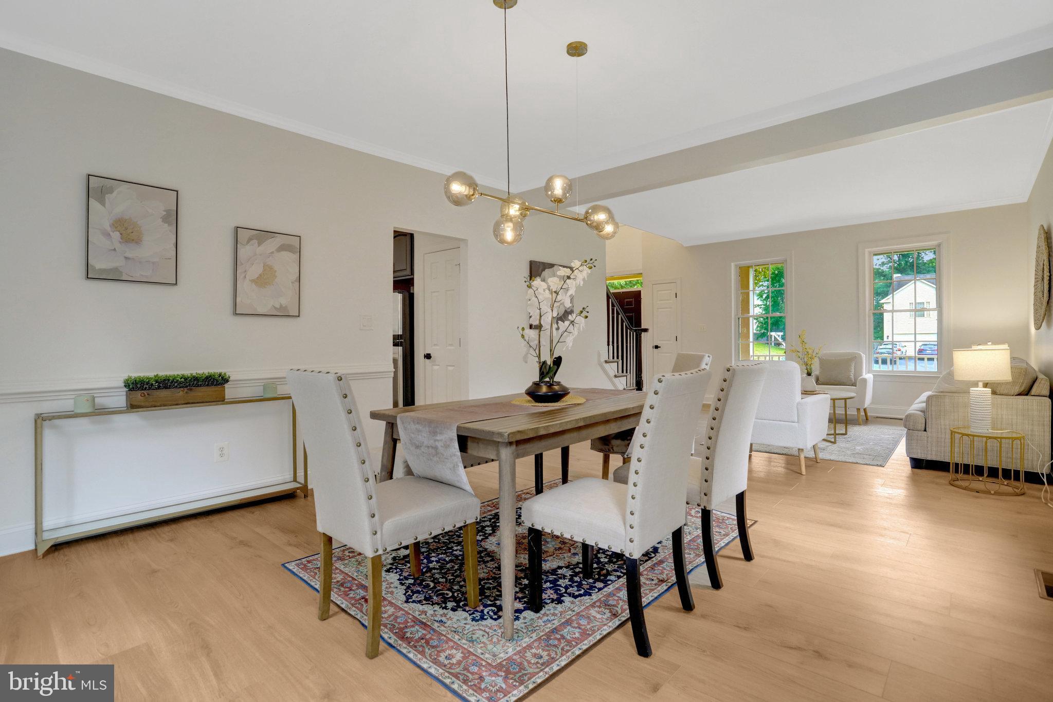 3905 Cook Street Alexandria, VA 22311 - Photo 9 of 39 a view of a dining room with furniture and wooden floor