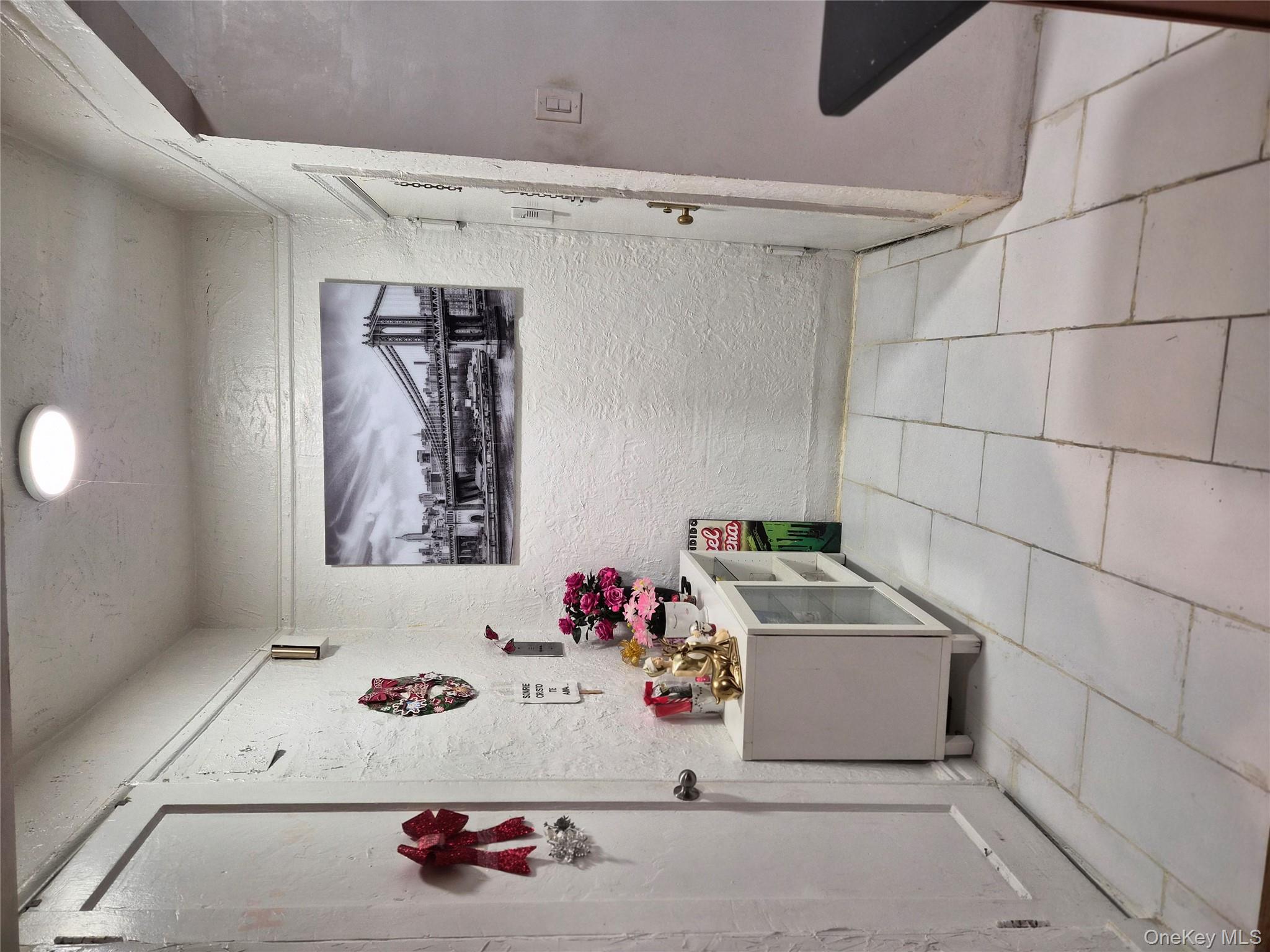 37-21 80th Street, Unit 1R Queens, NY 11372 - Photo 4 of 5 a storage room with a window