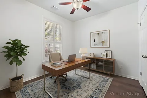 a view of a workspace with furniture