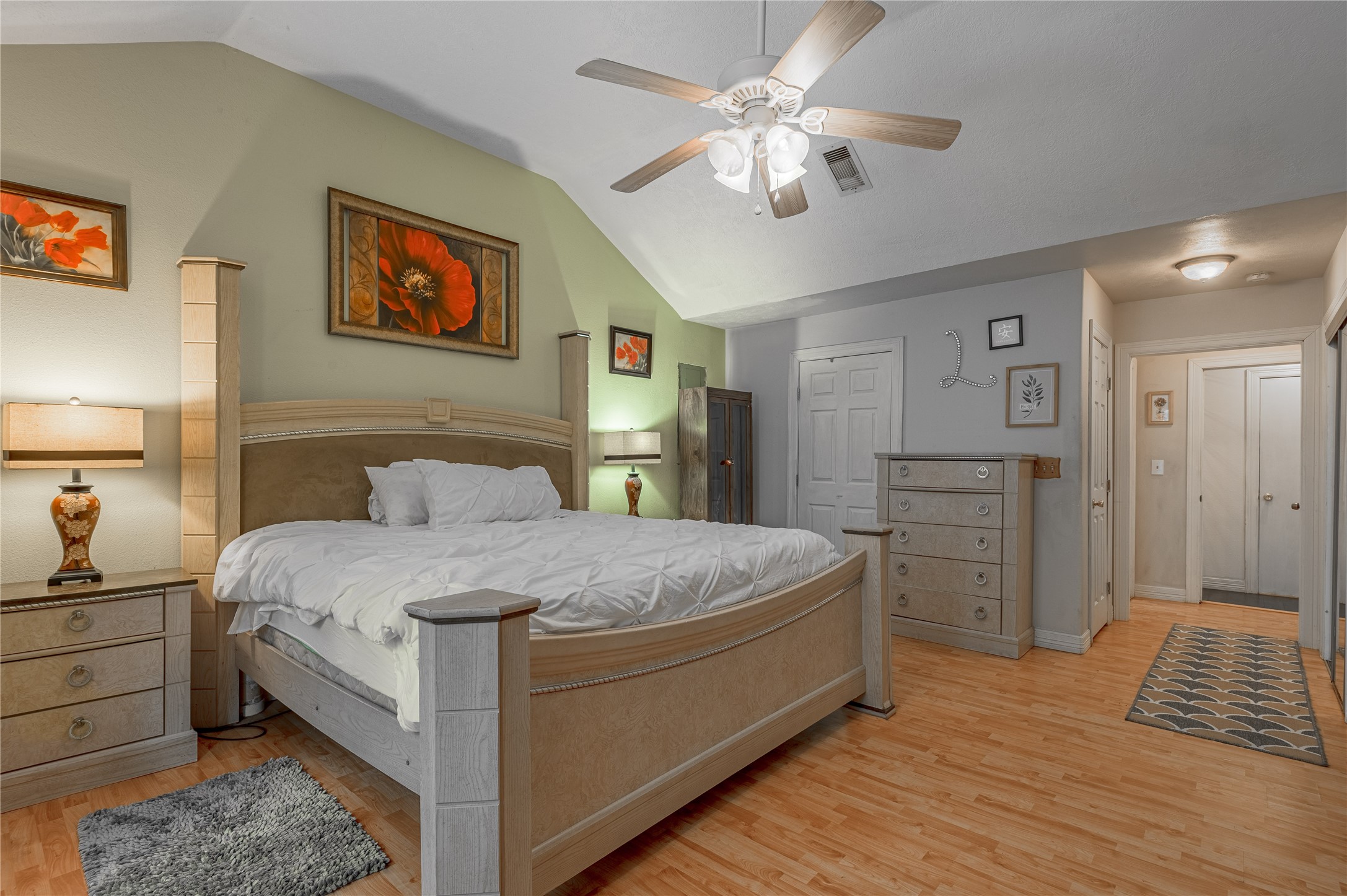 47-57 Stage Coach Road Coldspring, TX 77331 - Photo 18 of 50 a bed room with a bed and a chandelier