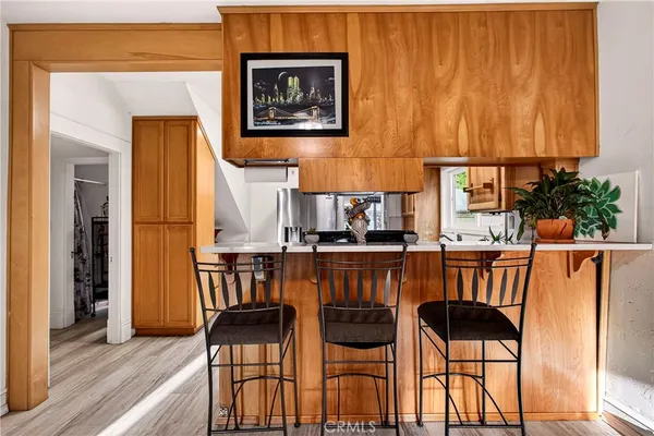 a kitchen with a sink and a window