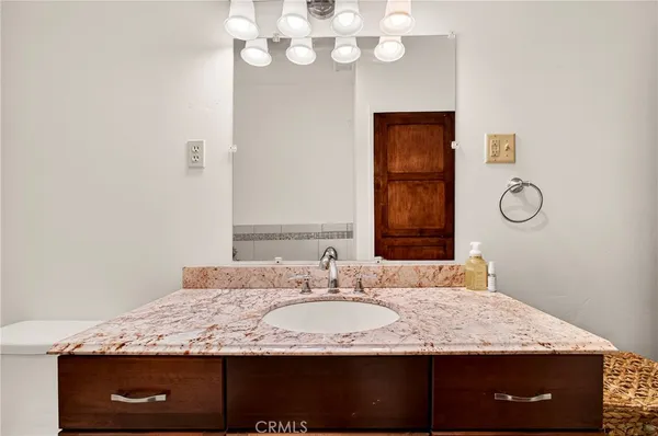 a view of a hallway with washer and dryer