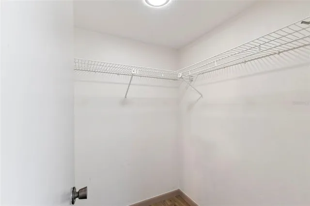 a view of a room with racks on the wall