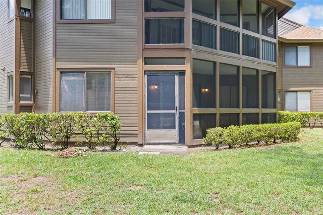 a view of swimming pool with a patio and a yard