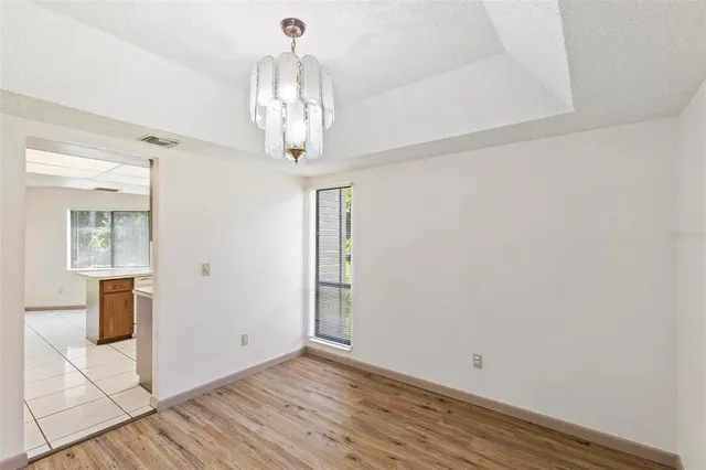 a view of a chandelier in a room