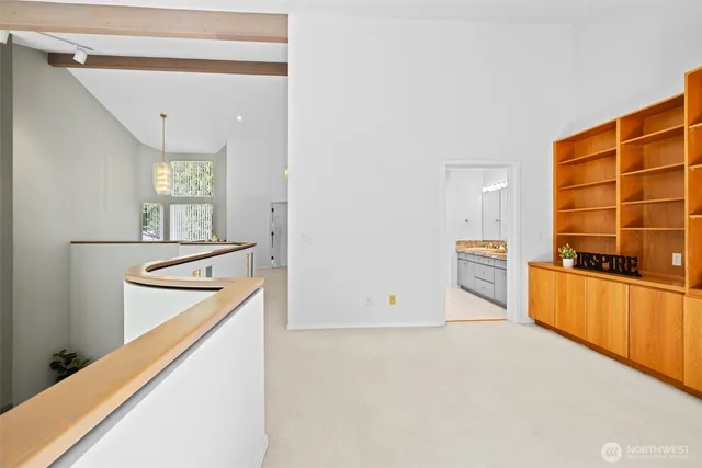 a view of a room with wooden floor and outdoor space