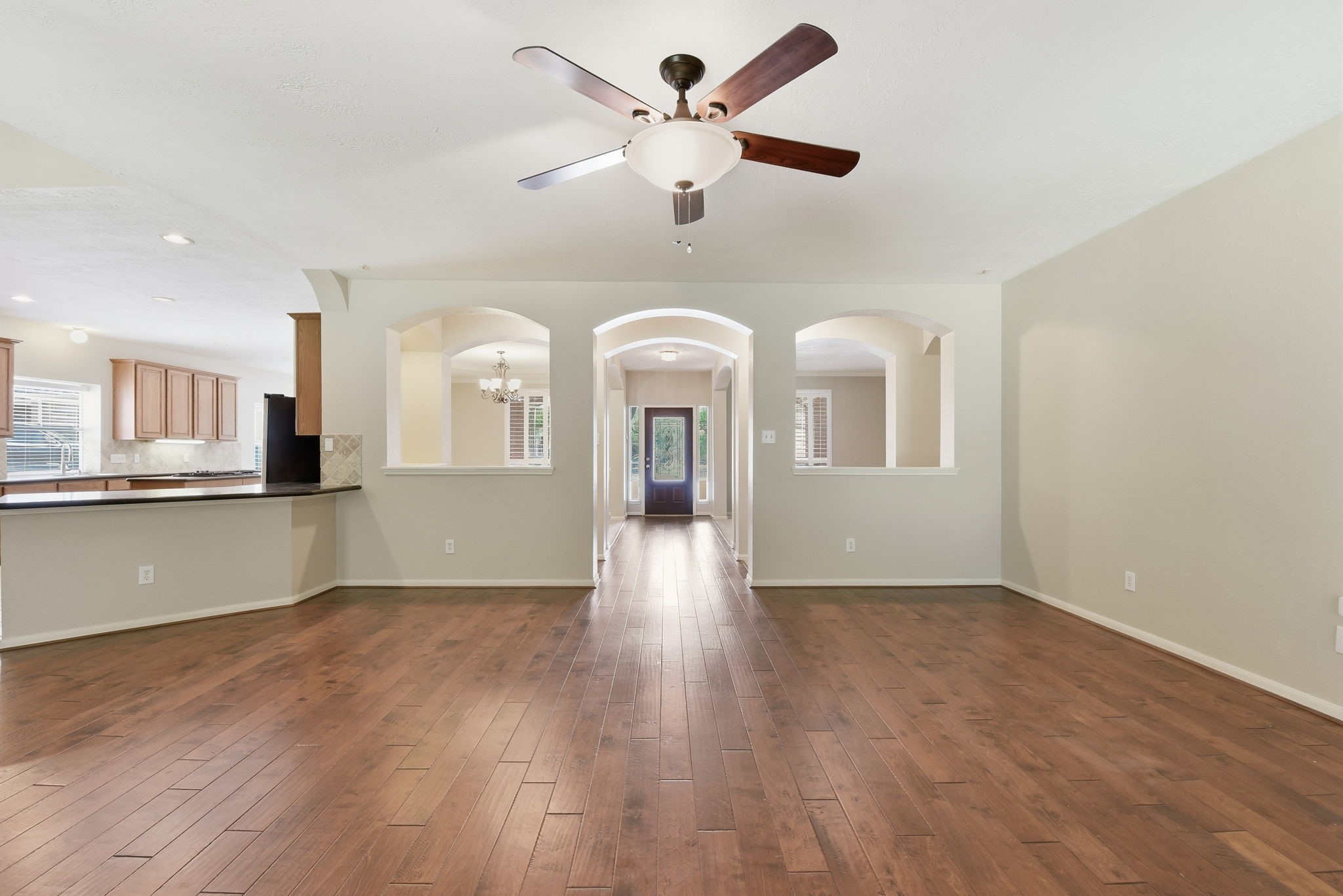 3414 Hackberry Court Spring, TX 77388 - Photo 13 of 50 From the fireplace area in the family room back toward the entryway.