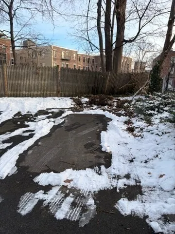 a view of a backyard of the house