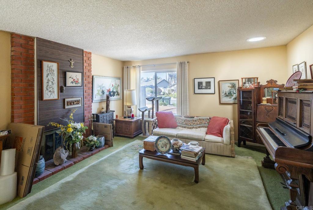 246 Witham Road Encinitas, CA 92024 - Photo 5 of 11 a living room with furniture rug and window