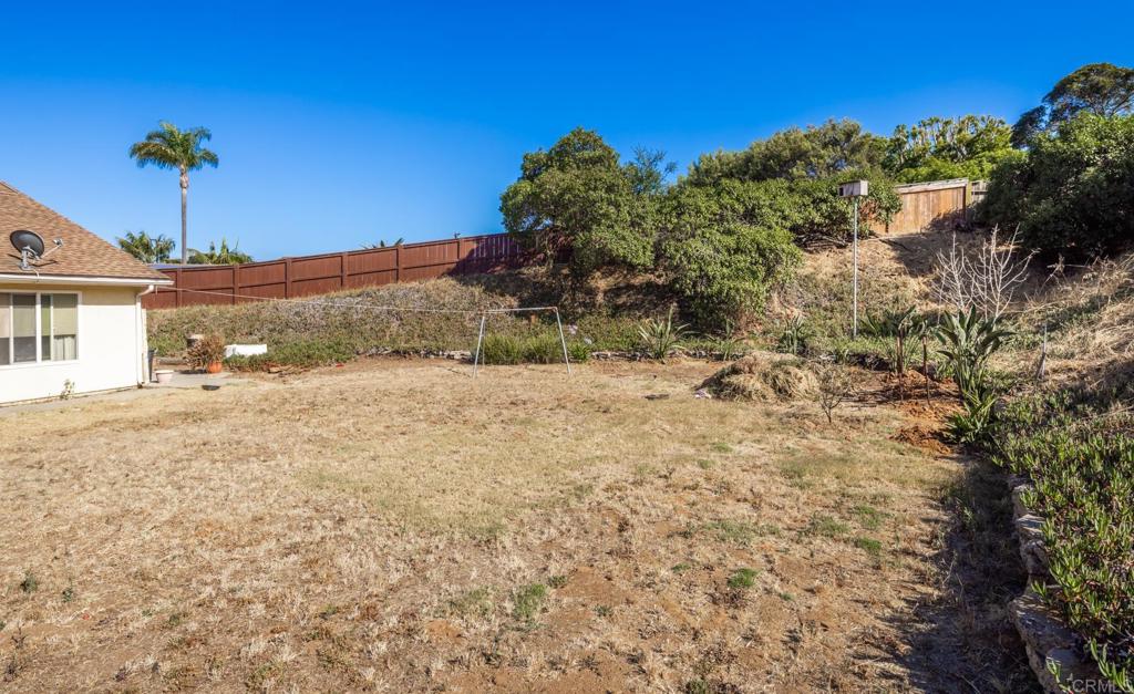 246 Witham Road Encinitas, CA 92024 - Photo 7 of 11 a view of a yard with a house