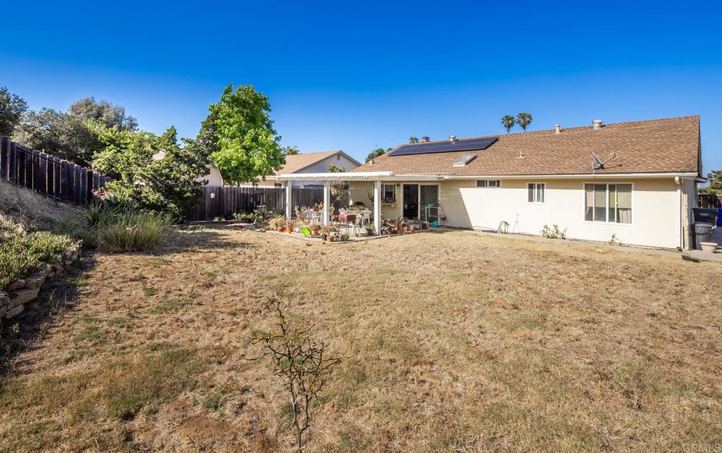 246 Witham Road Encinitas, CA 92024 - Photo 8 of 11 a front view of a house with a yard