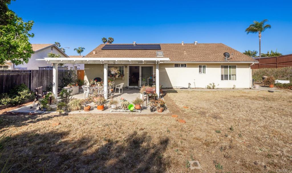246 Witham Road Encinitas, CA 92024 - Photo 9 of 11 a front view of house with yard outdoor seating and barbeque oven